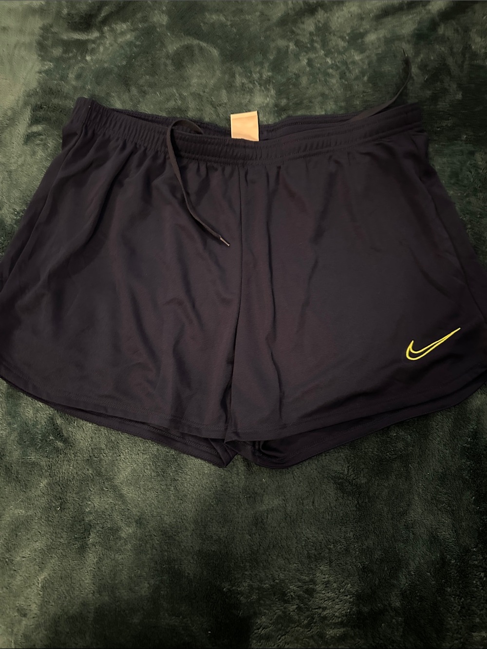 Nike Women's Navy Athletic Shorts with Yellow Swoosh